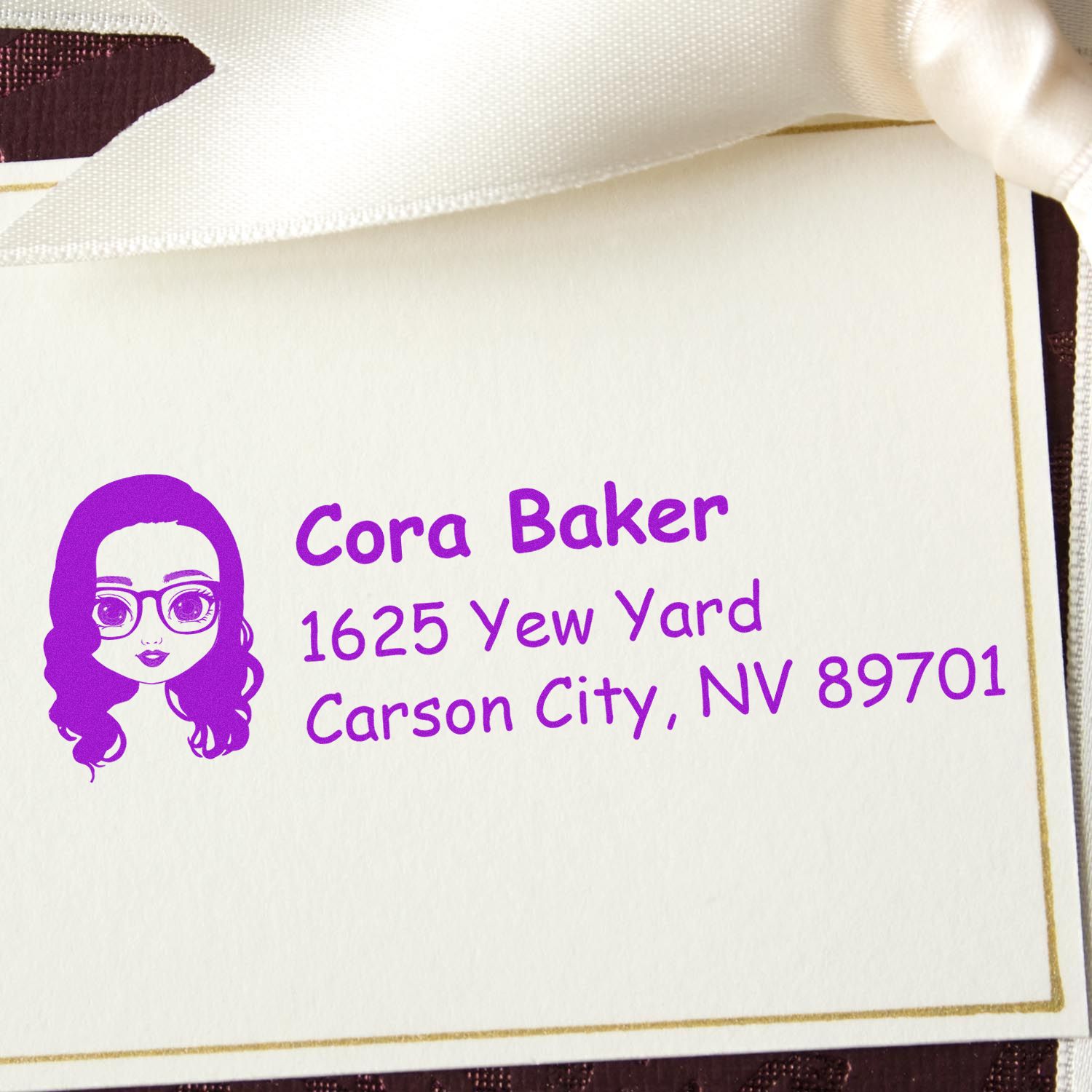 Custom rubber address stamp for Cora Baker with illustrated portrait and Carson City, NV return address.