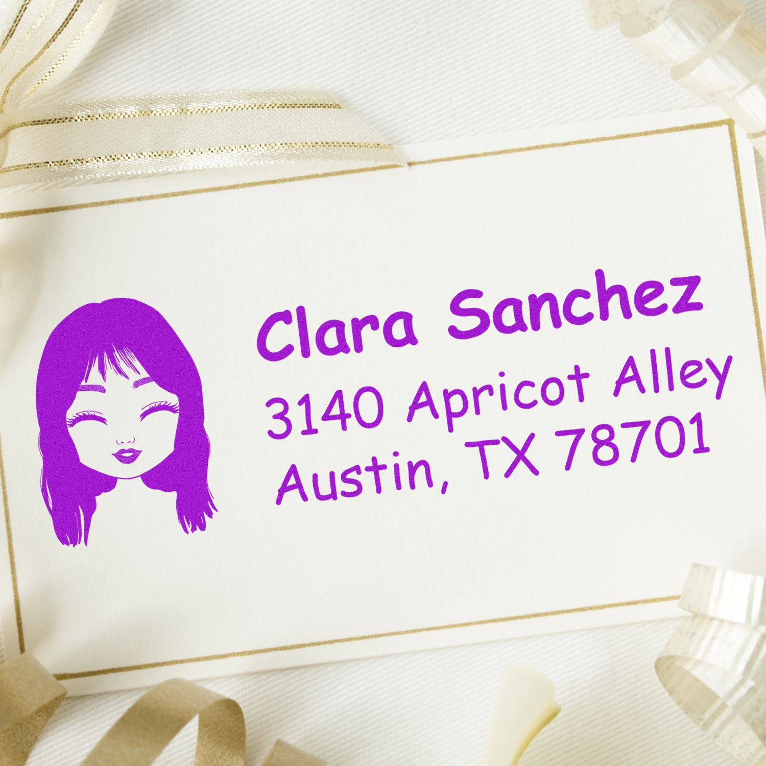 Custom return address rubber stamp in purple ink with portrait design for Clara Sanchez, Austin, TX envelope mail