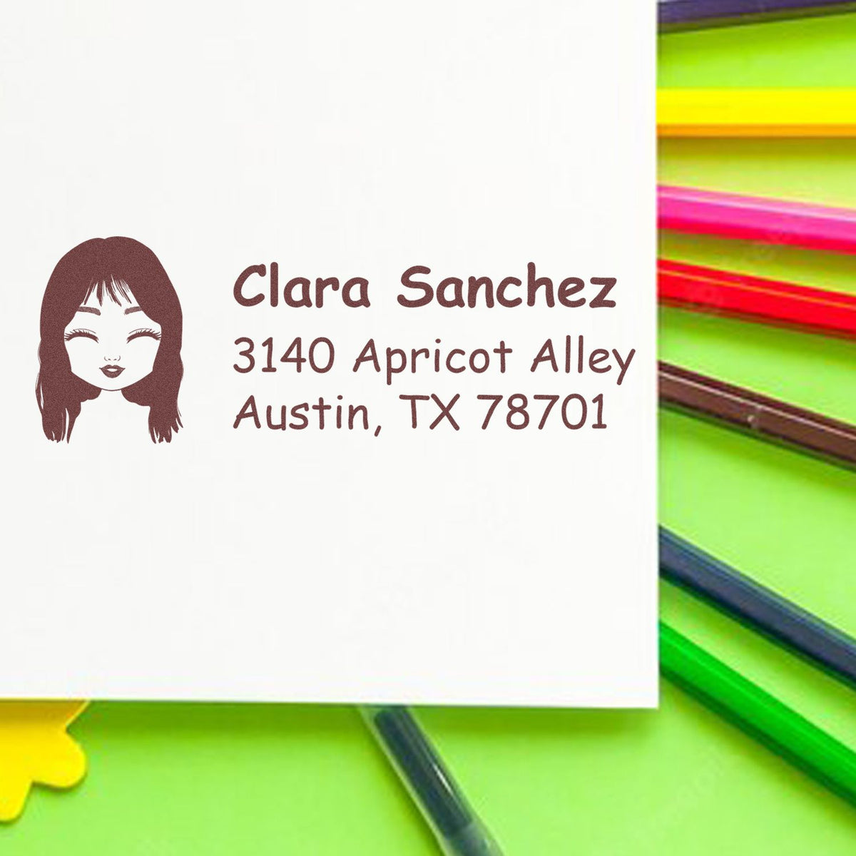 Custom self-inking address stamp with female portrait, name, and Austin TX return address for personalized mail.