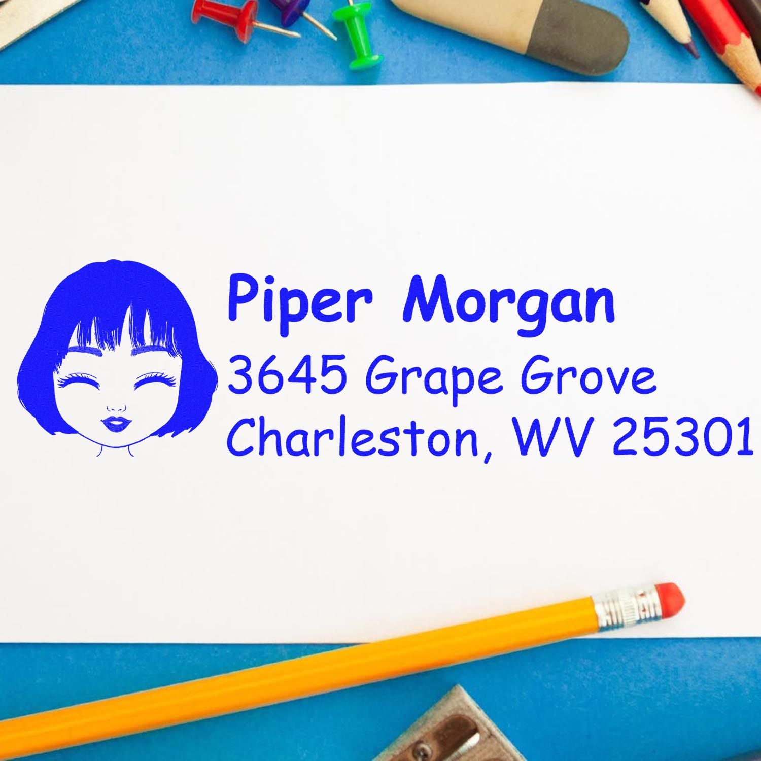 Custom rubber address stamp with girl face icon, personalized for Piper Morgan, Charleston, WV 25301.