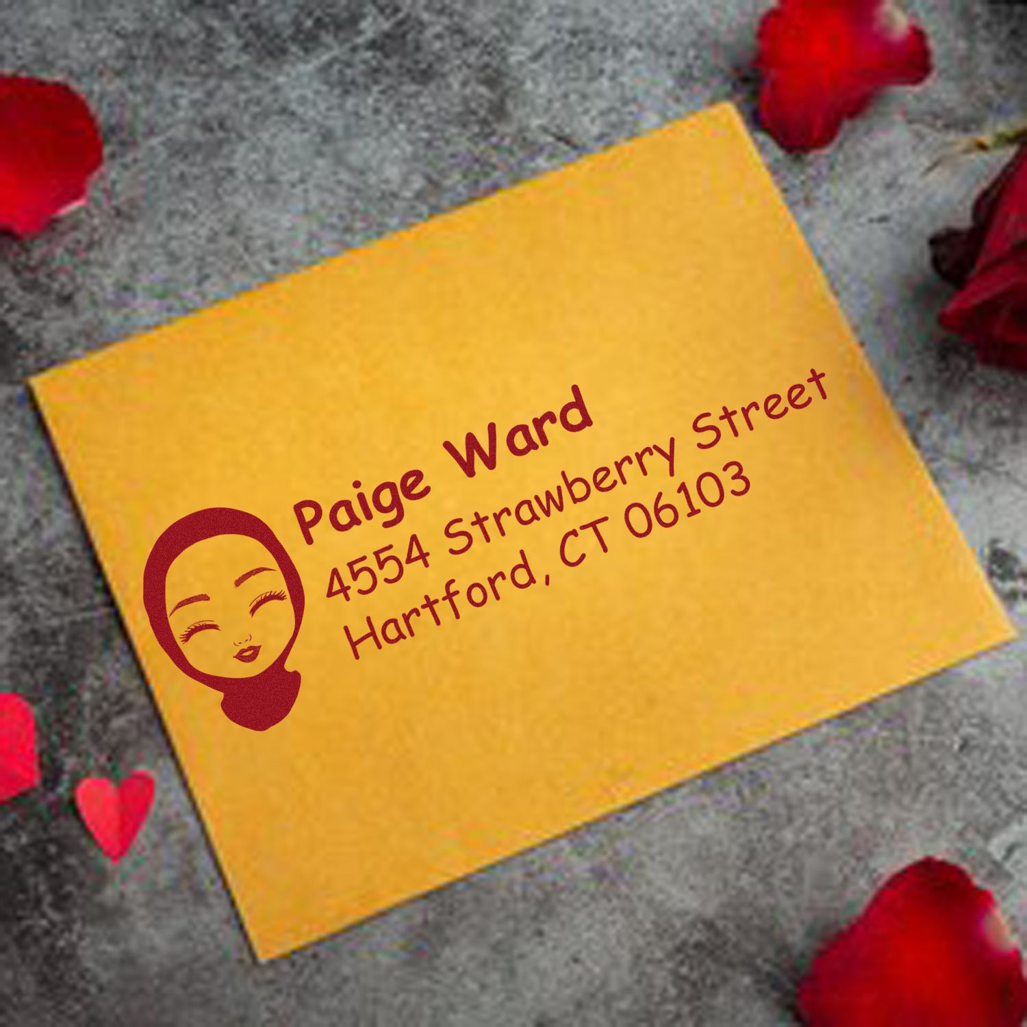 Personalized return address rubber stamp on yellow envelope, featuring name and Hartford, CT mailing address.