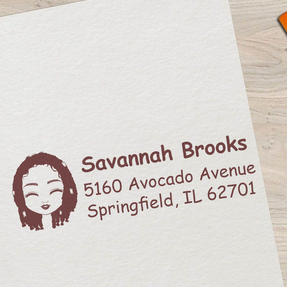 Personalized return address rubber stamp with female portrait, Savannah Brooks, 5160 Avocado Avenue, Springfield, IL 62701.