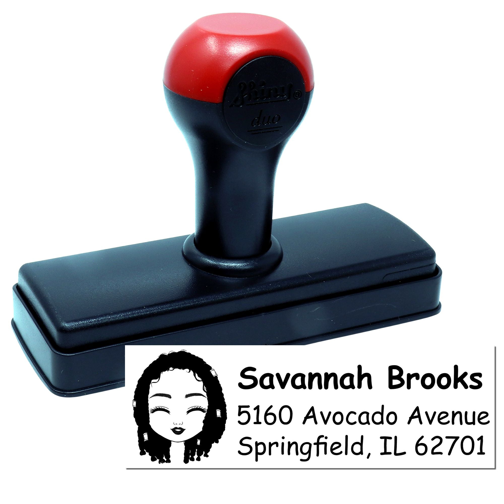 Custom self-inking rubber address stamp with name, address, and portrait logo for personalized mailing.