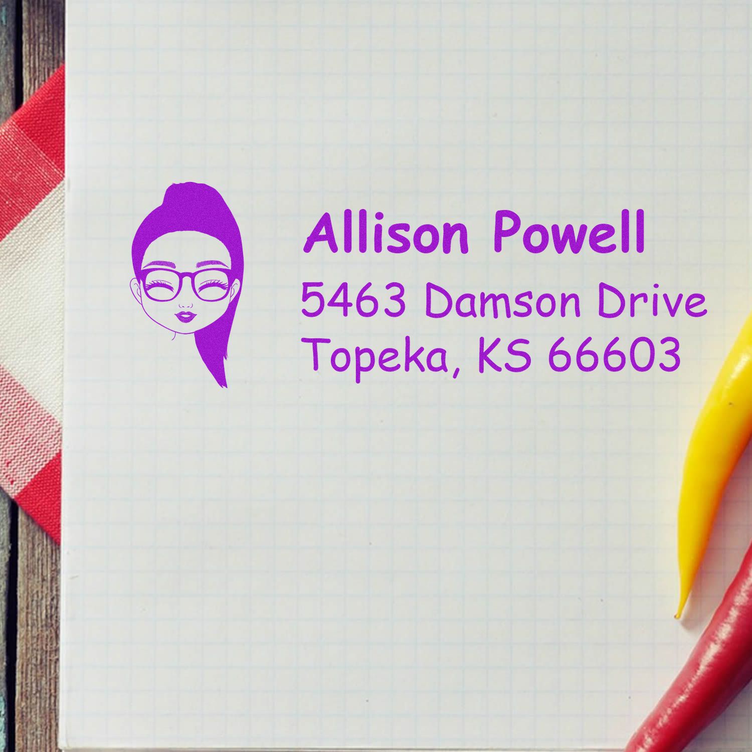 Personalized return address rubber stamp with woman logo for Allison Powell, Topeka, KS 66603.