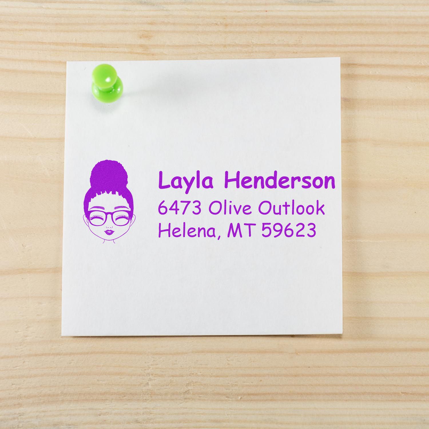 Custom return address rubber stamp with avatar design for Layla Henderson, Helena, MT on a white card.