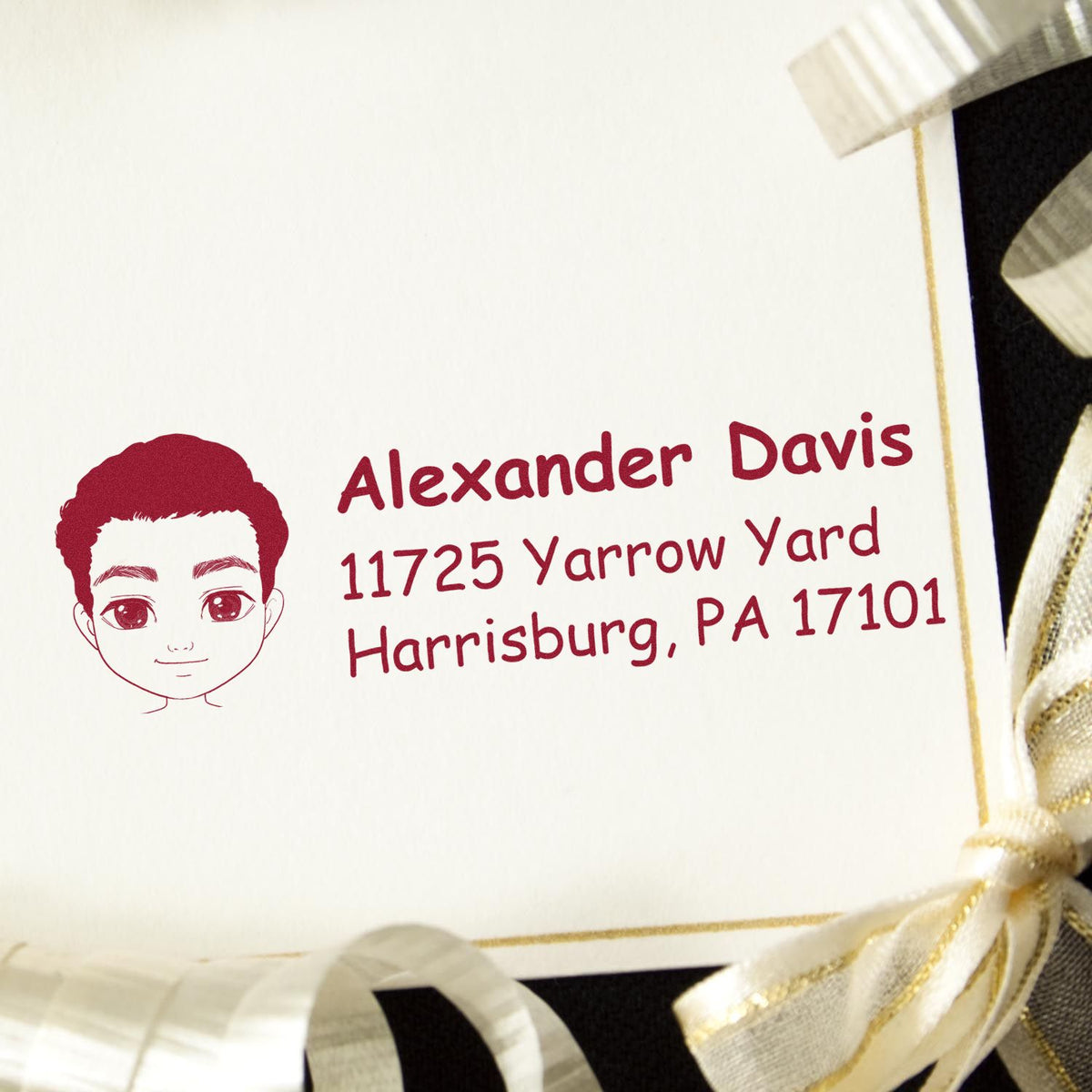 Custom kids return address rubber stamp with Alexander Davis name, address, and face icon for envelopes.