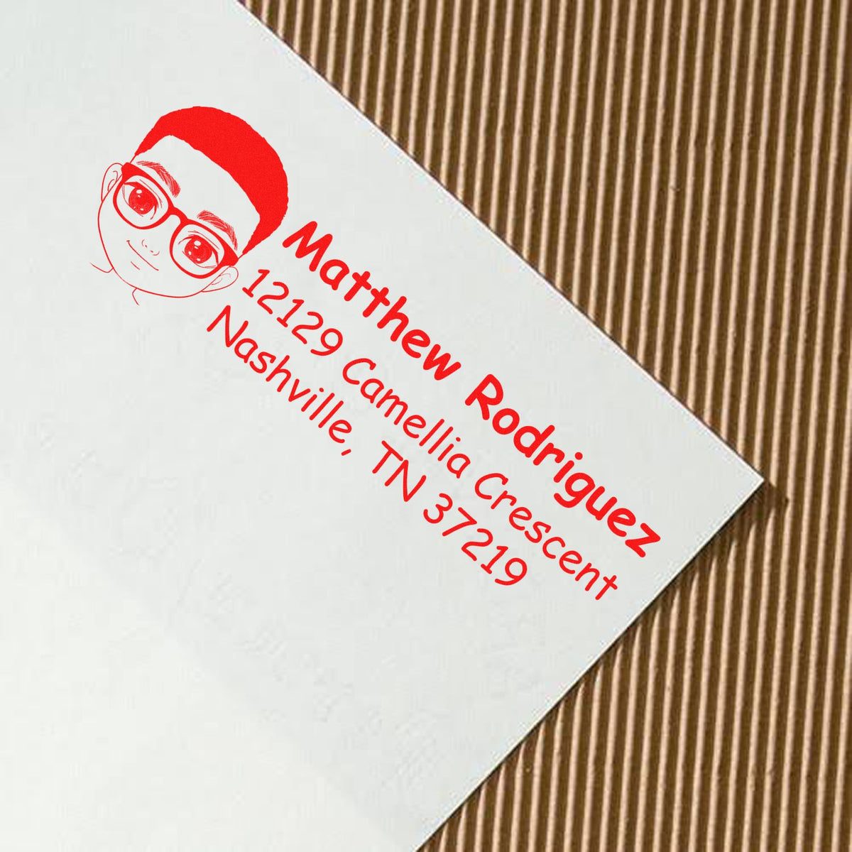 Custom rubber address stamp with cartoon portrait and Nashville, TN return address for Matthew Rodriguez