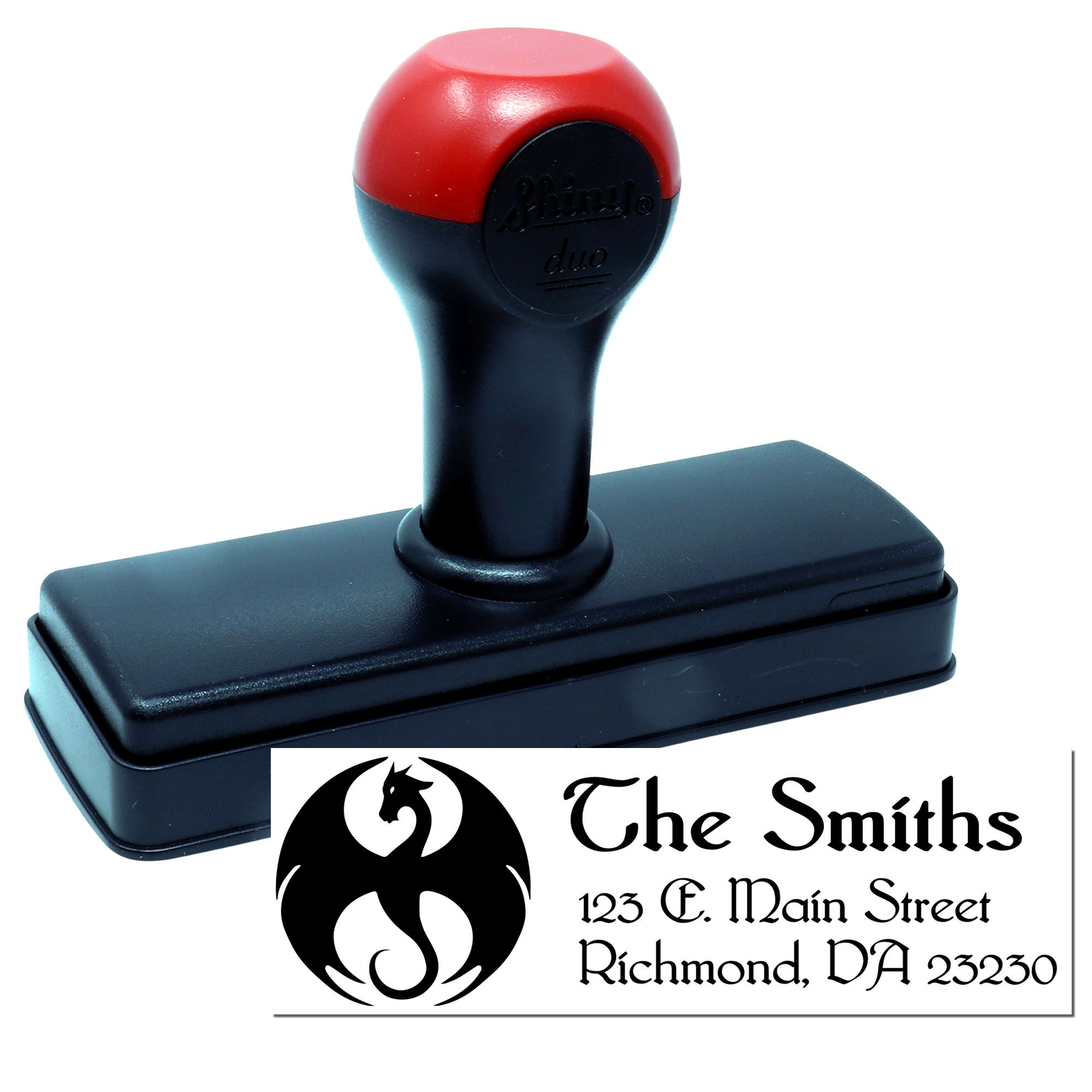 Custom self-inking rubber stamp with logo and business address for personalized branding, mail, and packaging.