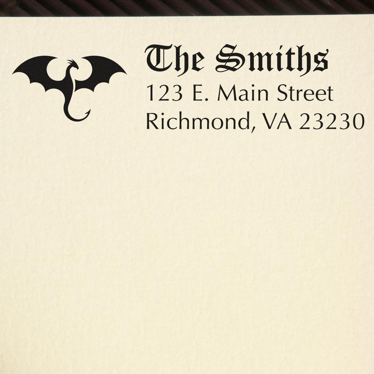 Custom return address rubber stamp with dragon logo for The Smiths, 123 E. Main Street, Richmond, VA 23230.