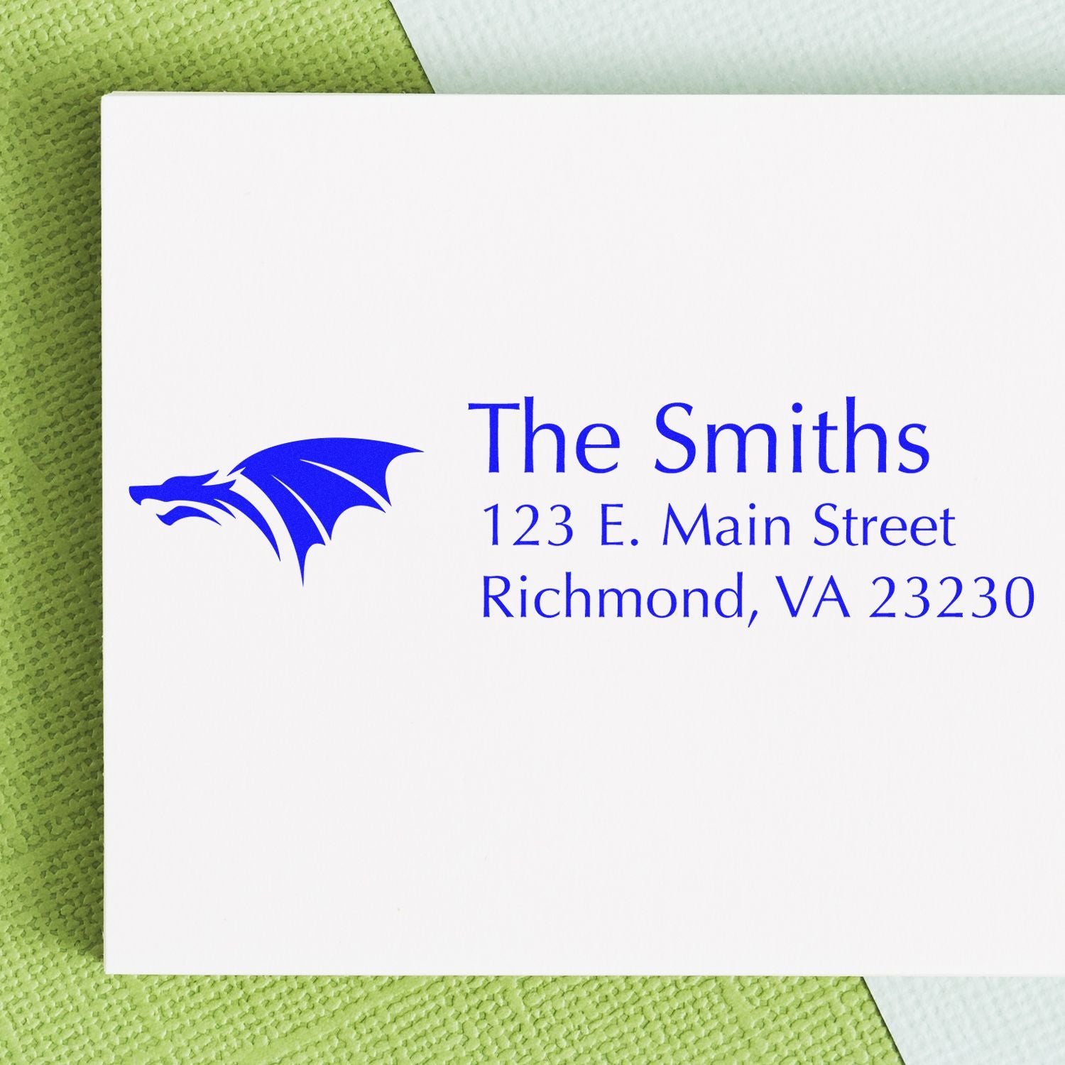 Custom address rubber stamp with dragon logo for The Smiths, 123 E. Main Street, Richmond, VA 23230.