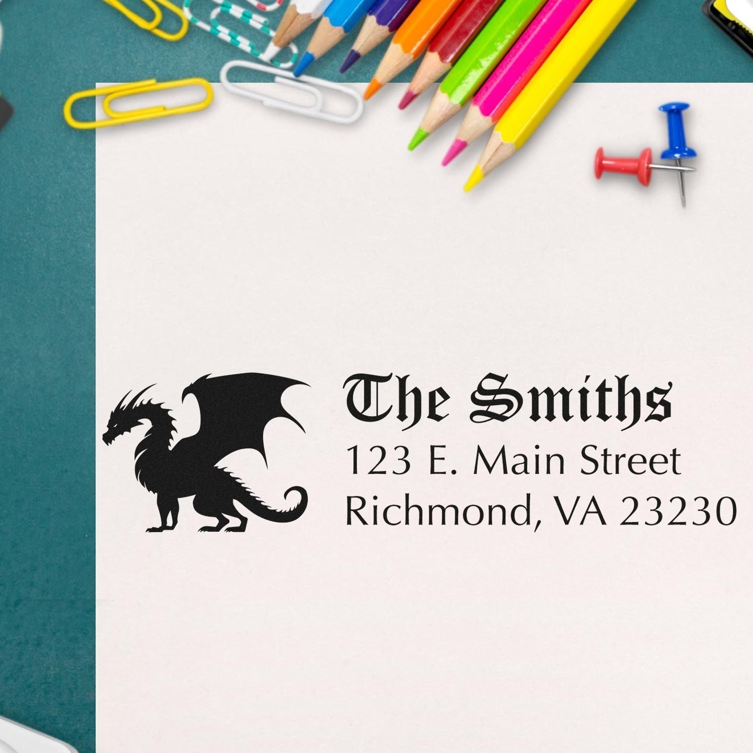 Custom rubber stamp with dragon logo and return address for The Smiths, Richmond, VA 23230.