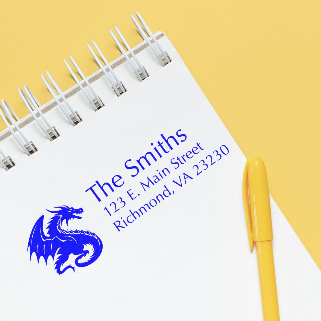 Custom address rubber stamp for The Smiths with dragon logo, 123 E. Main Street, Richmond, VA 23230.