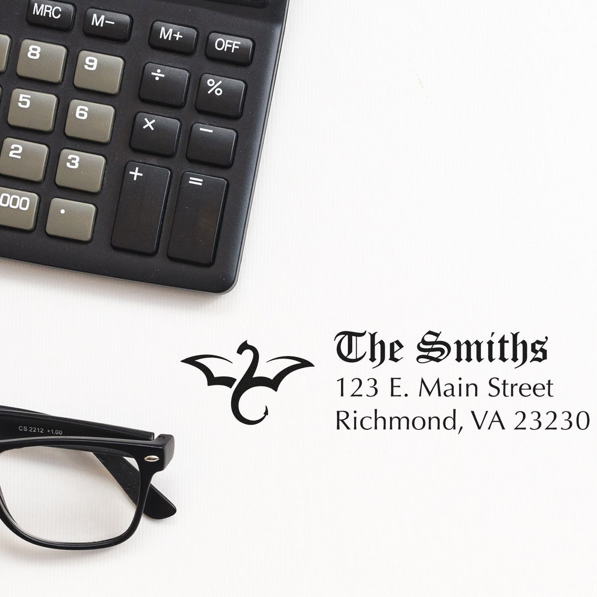 Custom rubber address stamp for The Smiths with logo and Richmond, VA mailing address, ideal for business mailings.