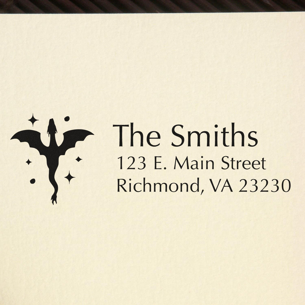 Custom rubber address stamp with bat silhouette and The Smiths family name, 123 E. Main Street, Richmond, VA 23230.