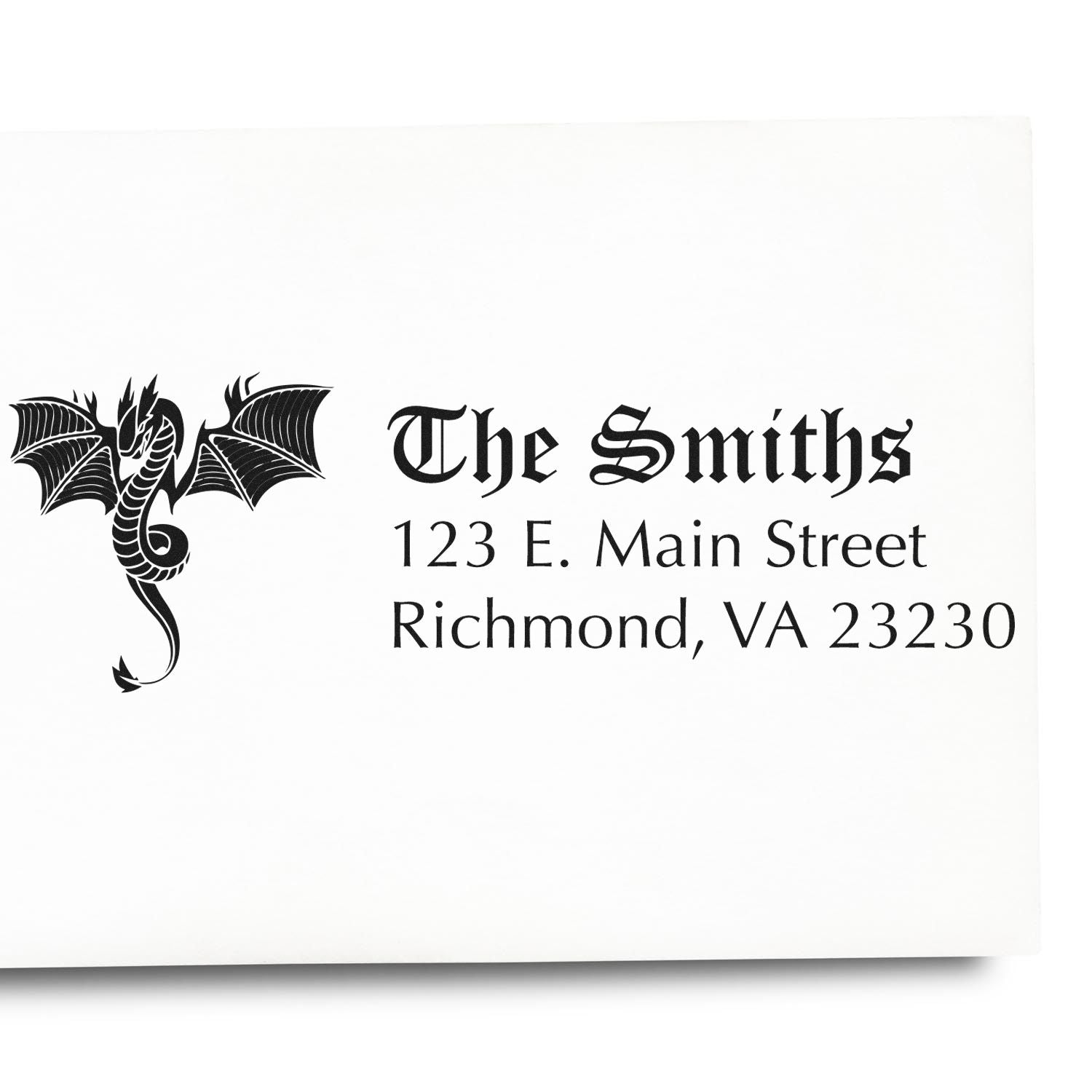 Custom rubber address stamp with dragon logo for The Smiths, 123 E. Main Street, Richmond, VA 23230.