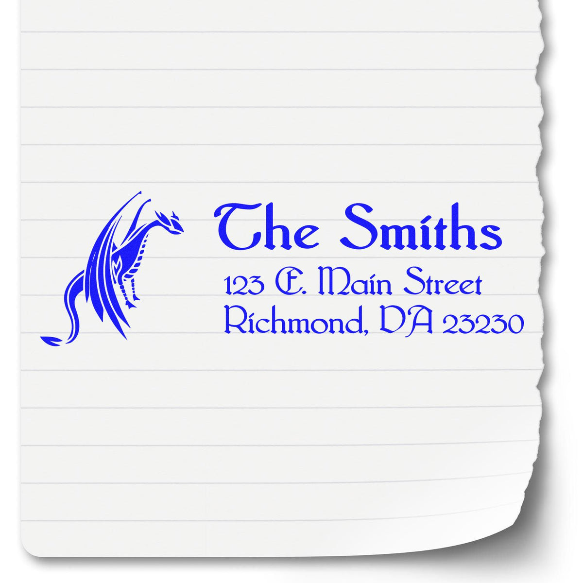 Custom rubber stamp for The Smiths with dragon logo, address, and blue ink impression on lined paper.