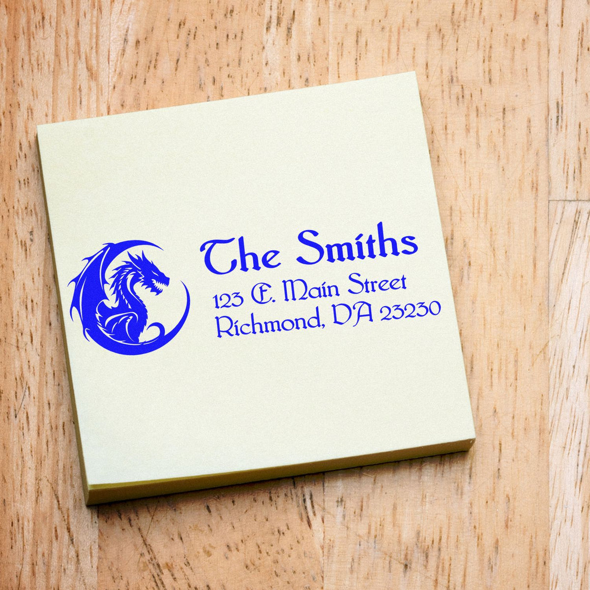 Custom family address rubber stamp for The Smiths with dragon logo and return address design