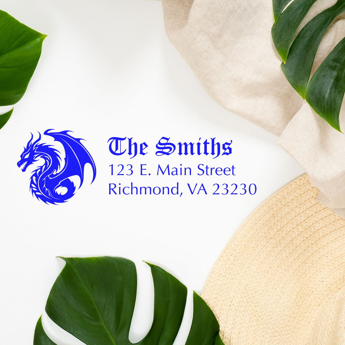 Custom rubber stamp with dragon logo and The Smiths address for personalized business or family mailing labels.