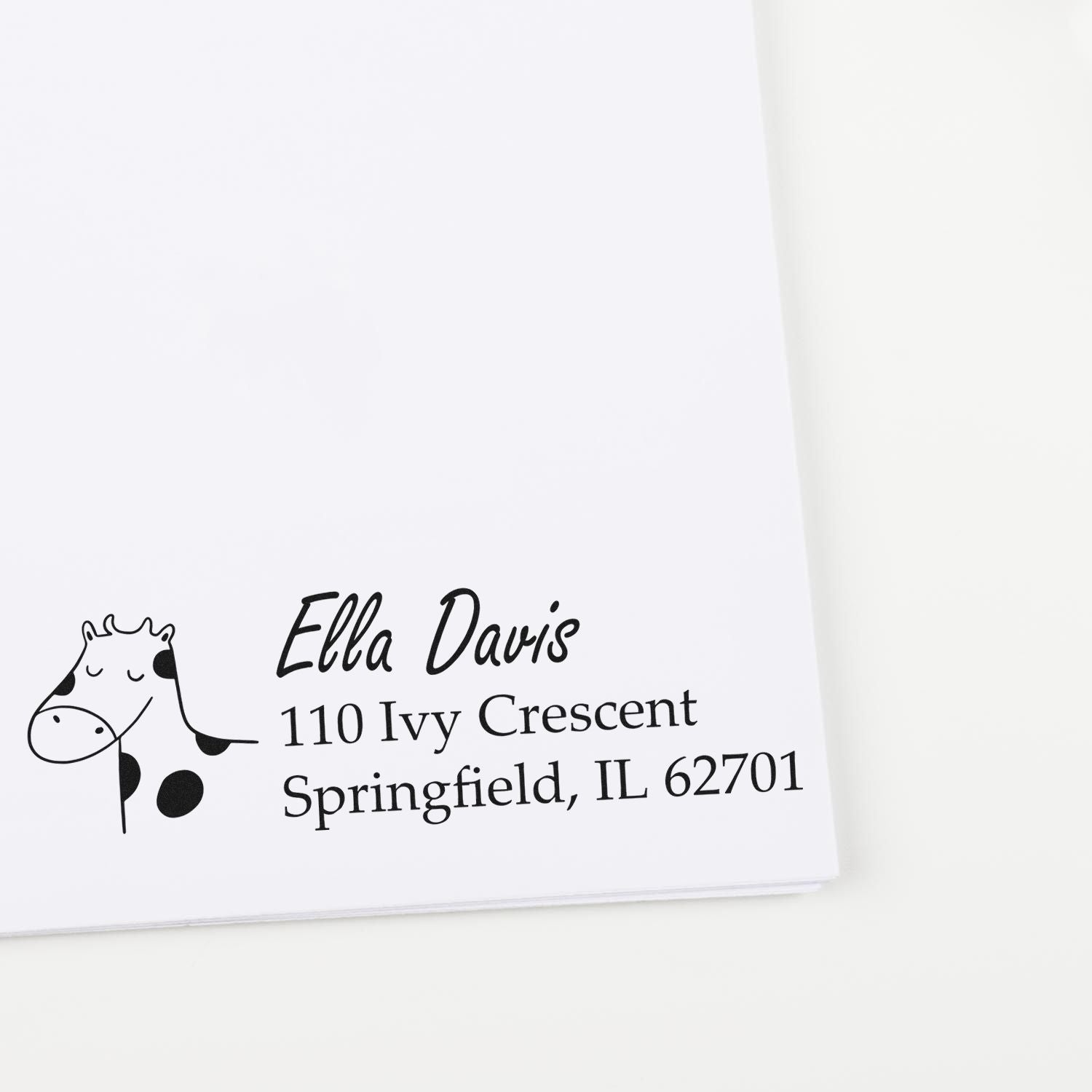 Personalized giraffe return address rubber stamp for Ella Davis, 110 Ivy Crescent, Springfield, IL.