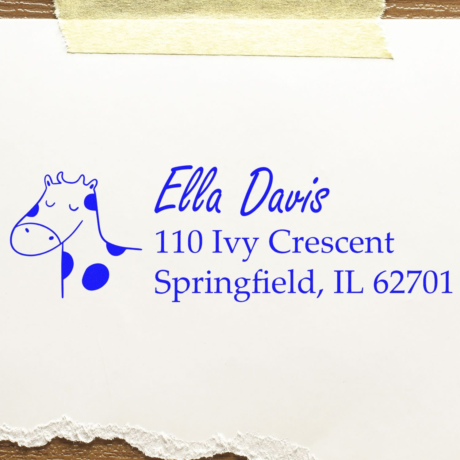 Personalized return address rubber stamp with giraffe design for custom mailing labels, featuring Ella Davis, Springfield, IL 62701.