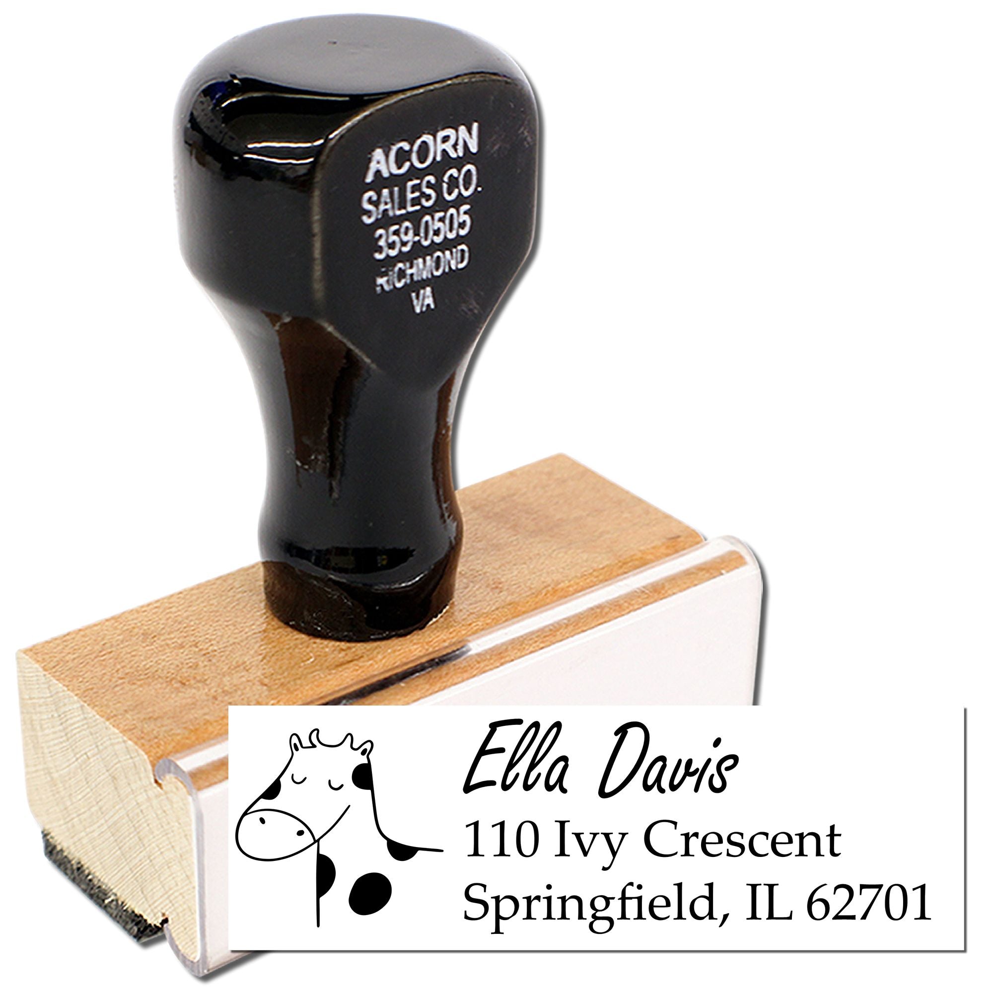 Custom address rubber stamp with cow design and wood handle, featuring personalized return mailing imprint.