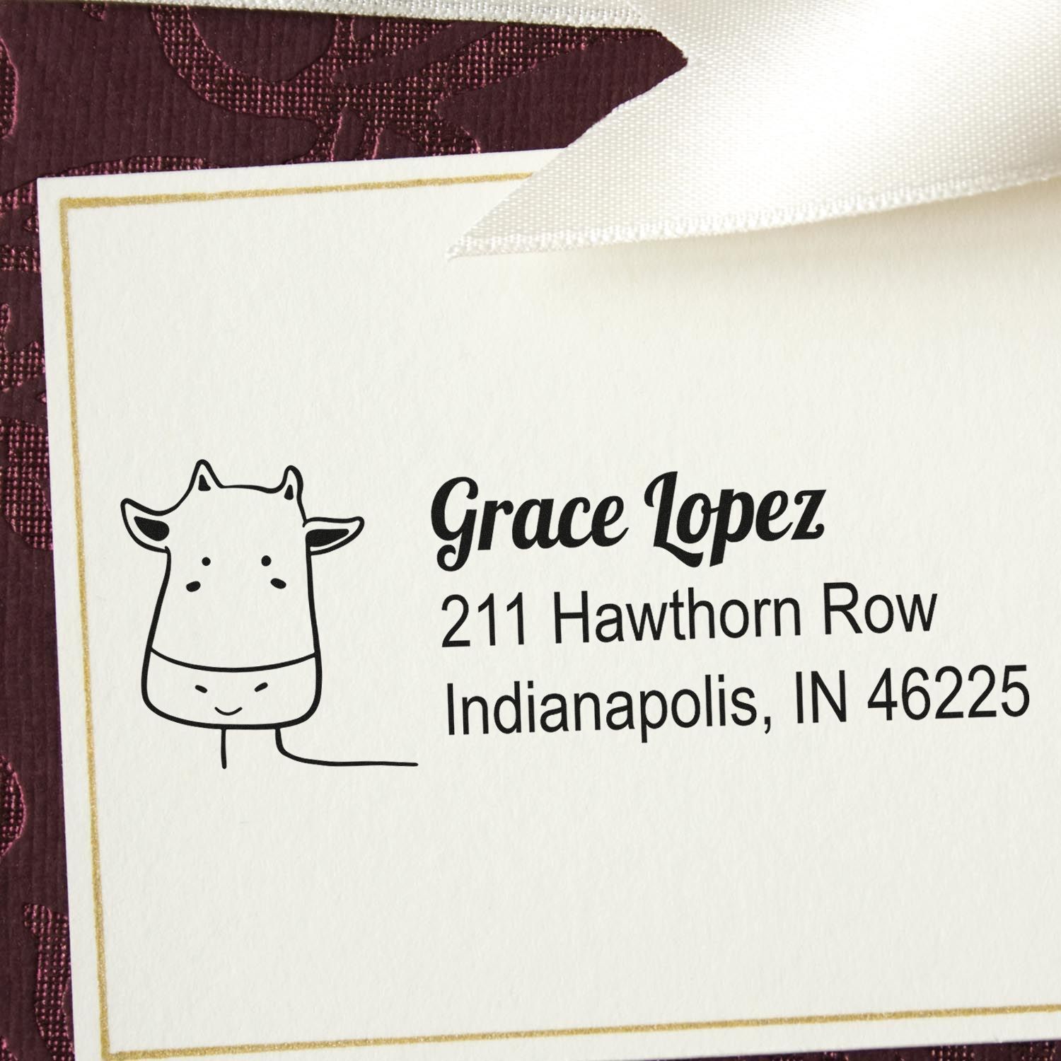 Custom address rubber stamp with giraffe icon, Grace Lopez name, and Indianapolis, IN return address