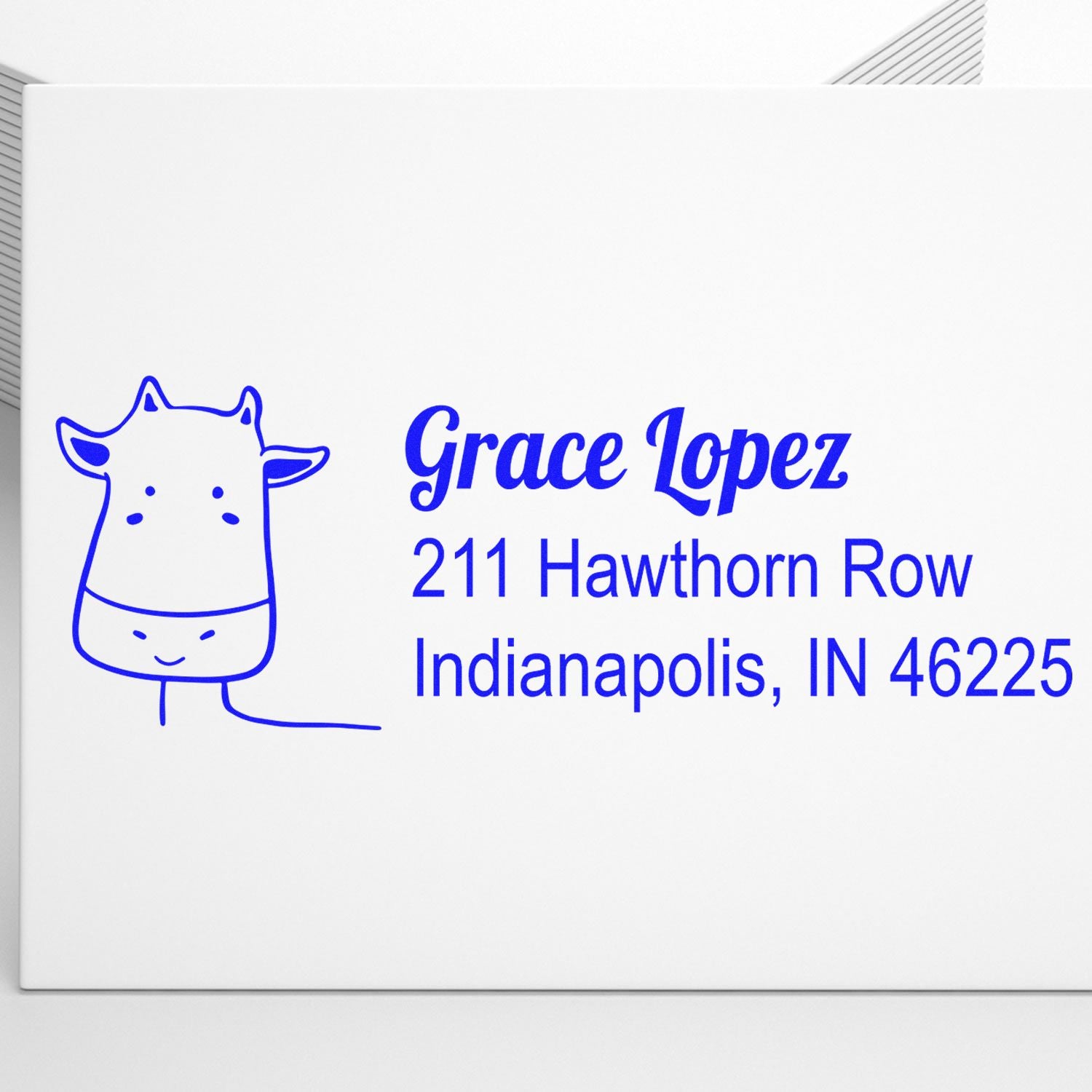 Personalized return address rubber stamp with giraffe icon for Grace Lopez, Indianapolis, IN 46225