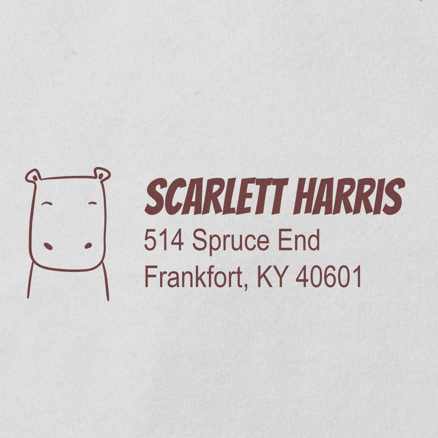 Custom rubber address stamp for Scarlett Harris, 514 Spruce End, Frankfort, KY 40601, with bear logo.