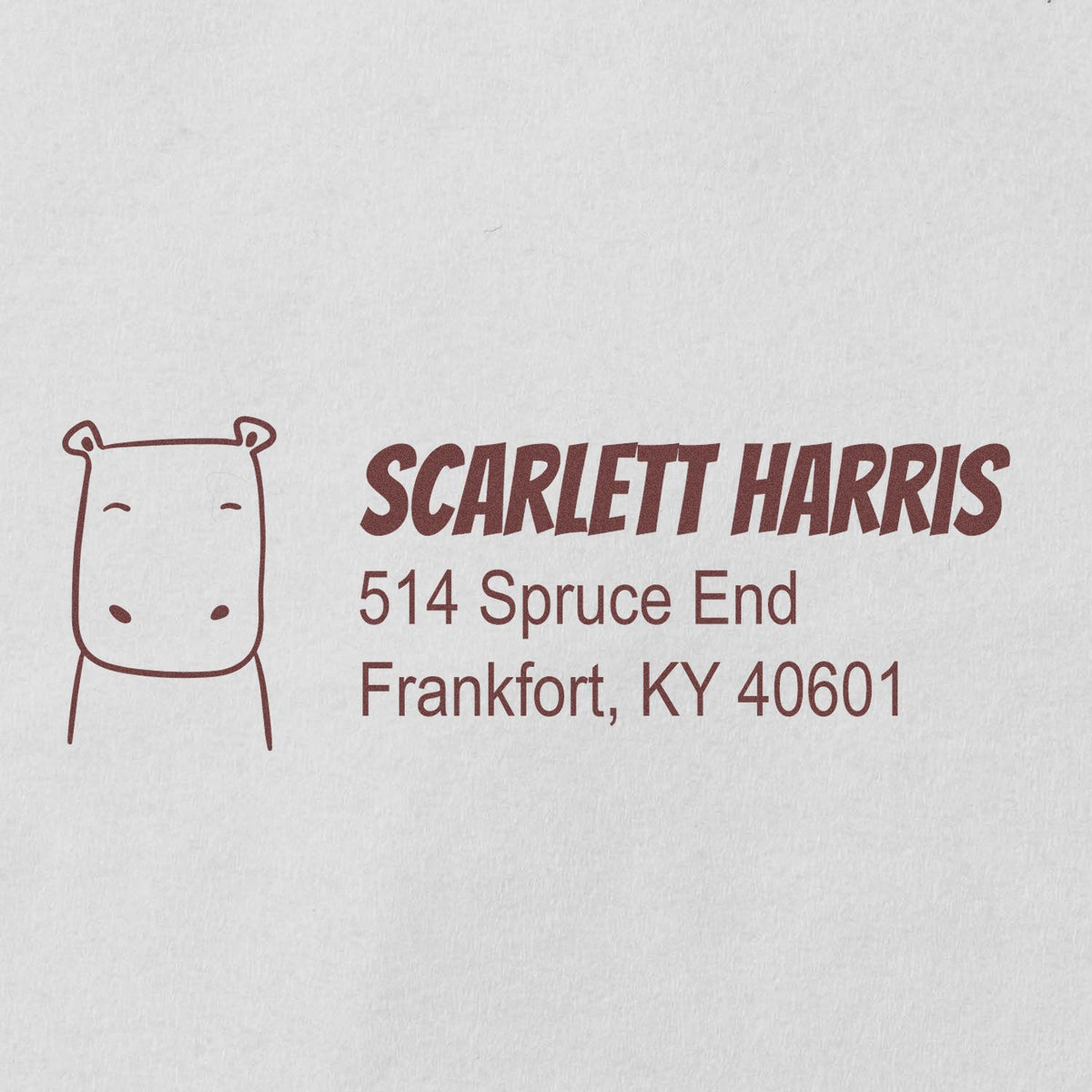 Custom return address rubber stamp with hippo icon, Scarlett Harris name, and Frankfort, KY mailing address.