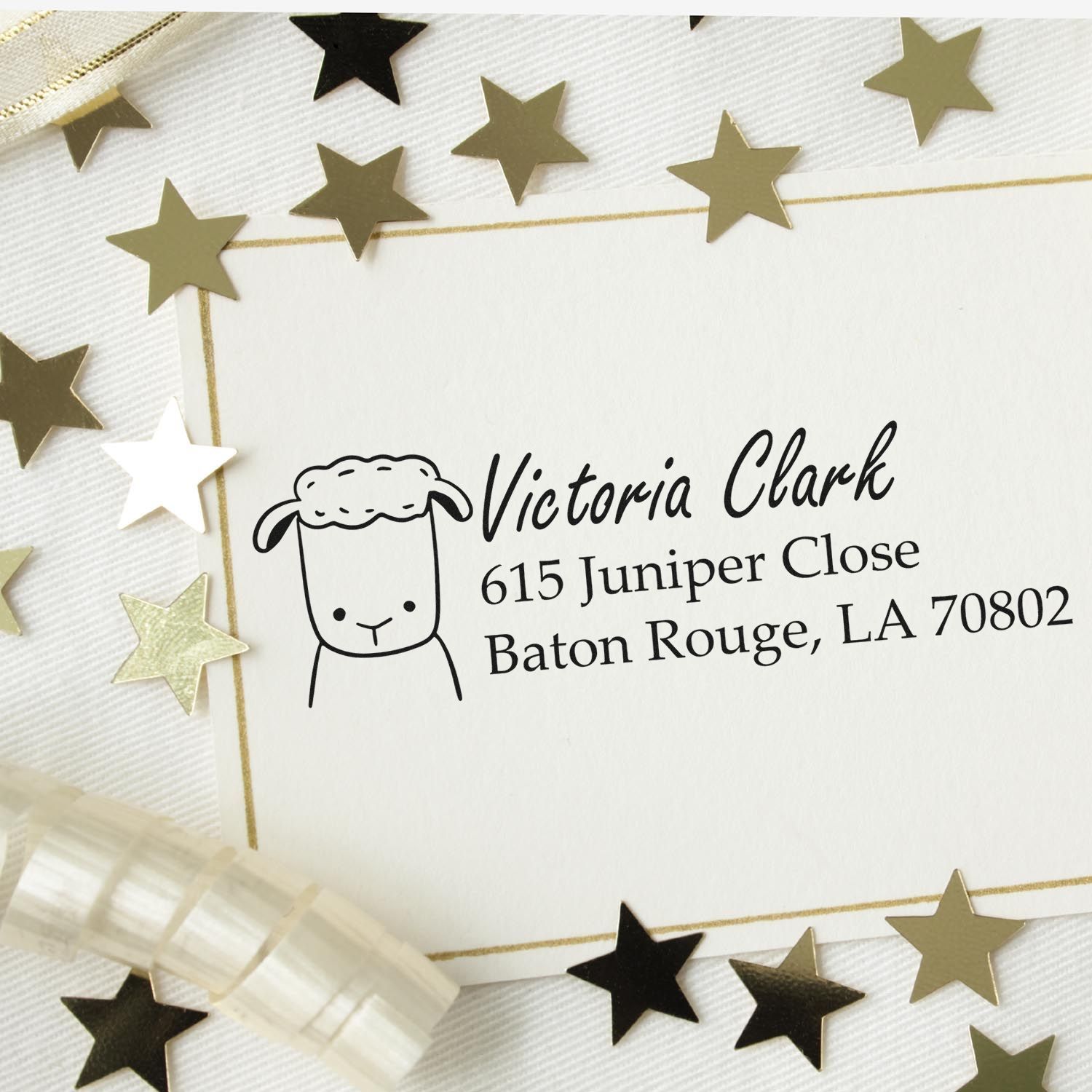 Custom return address rubber stamp with sheep icon for Victoria Clark, Baton Rouge, LA.