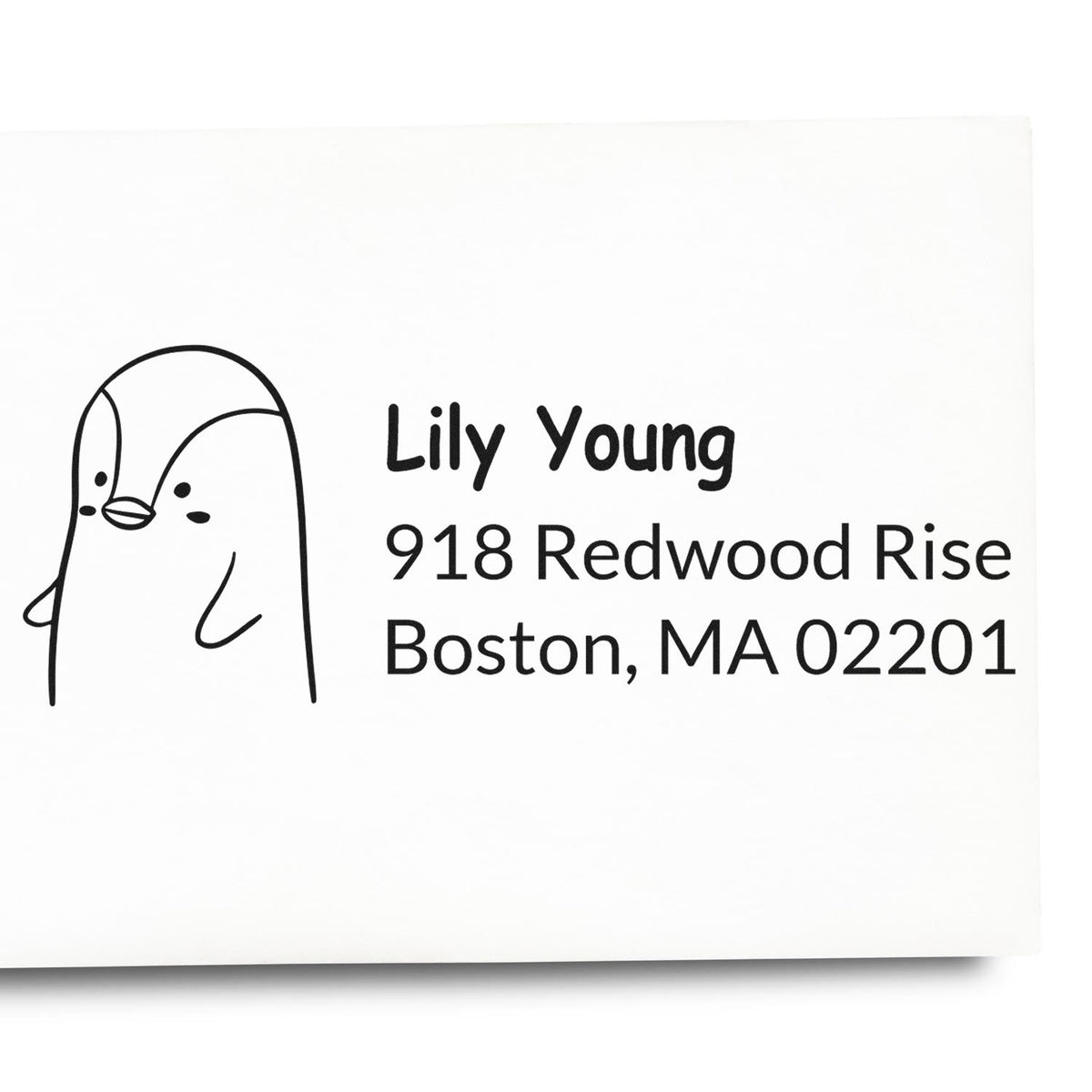 Custom rubber return address stamp with penguin design for Lily Young, 918 Redwood Rise, Boston, MA 02201