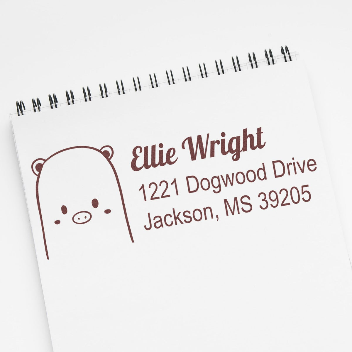 Custom return address rubber stamp with bear design for Ellie Wright, Jackson, MS 39205.