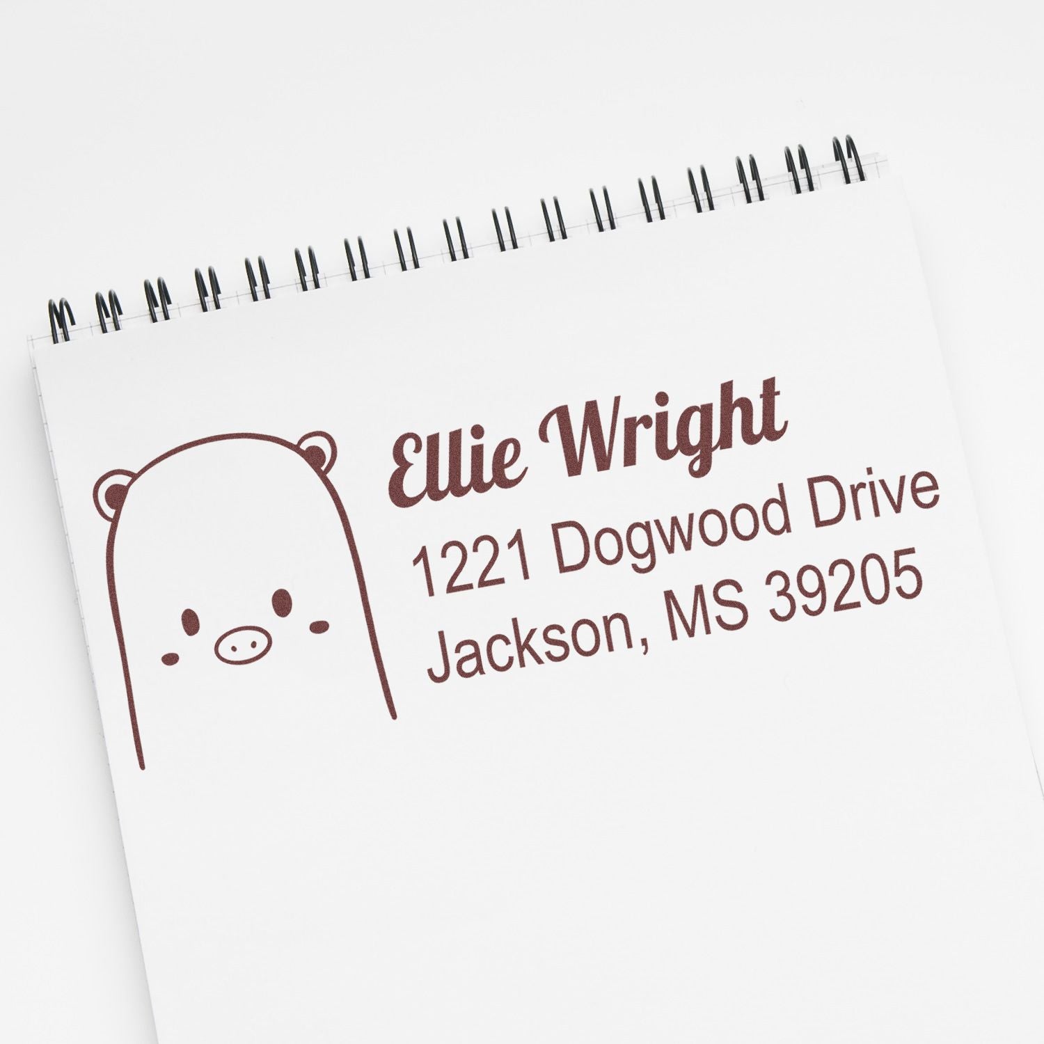 Personalized return address rubber stamp with bear icon for Ellie Wright, 1221 Dogwood Drive, Jackson, MS 39205