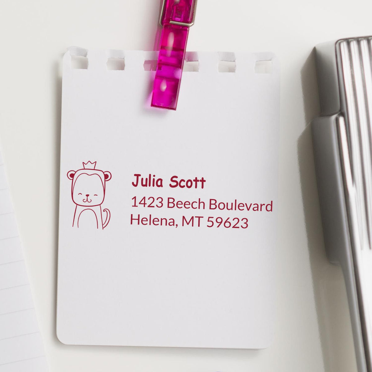 Personalized return address rubber stamp sample with bear icon for Julia Scott, Helena, MT 59623.