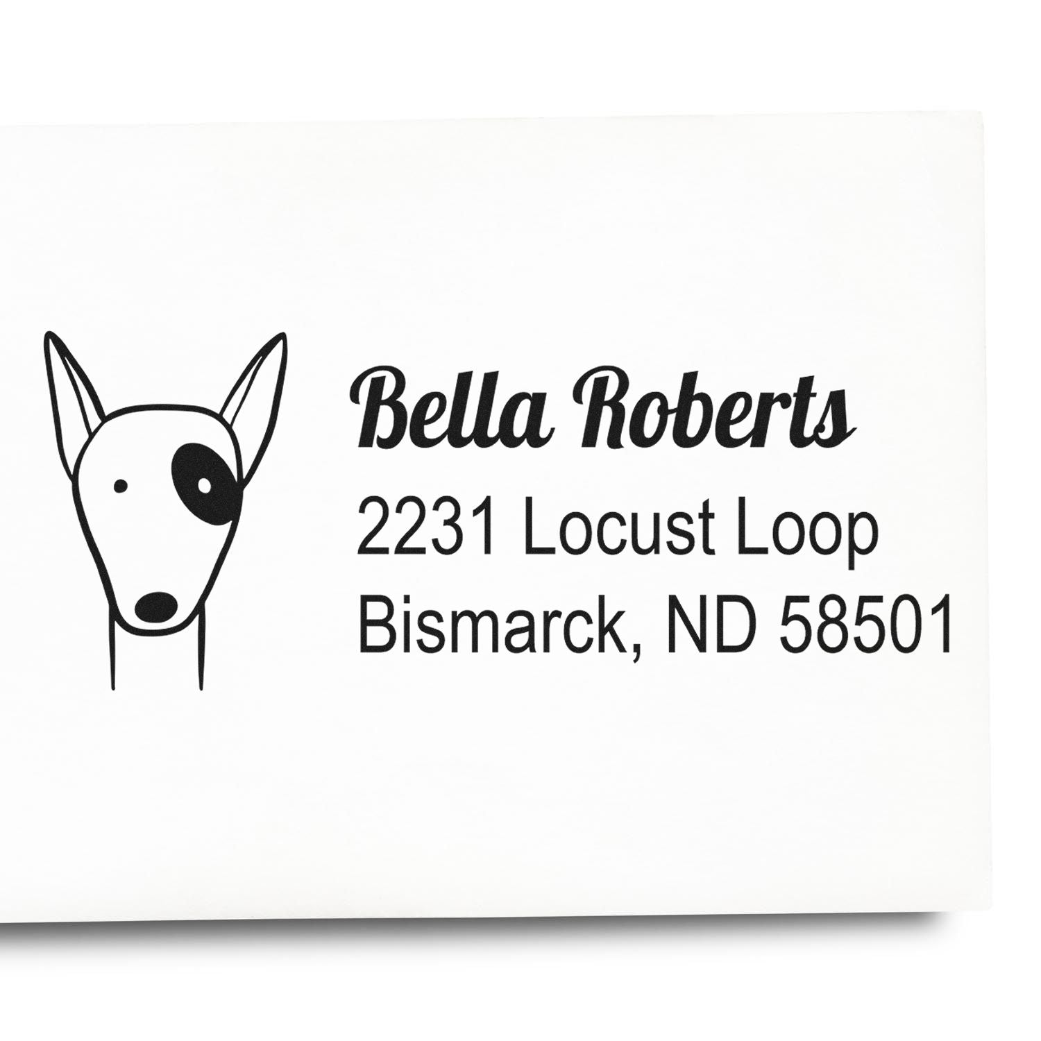 Custom rubber return address stamp with dog logo for Bella Roberts, 2231 Locust Loop, Bismarck, ND 58501.