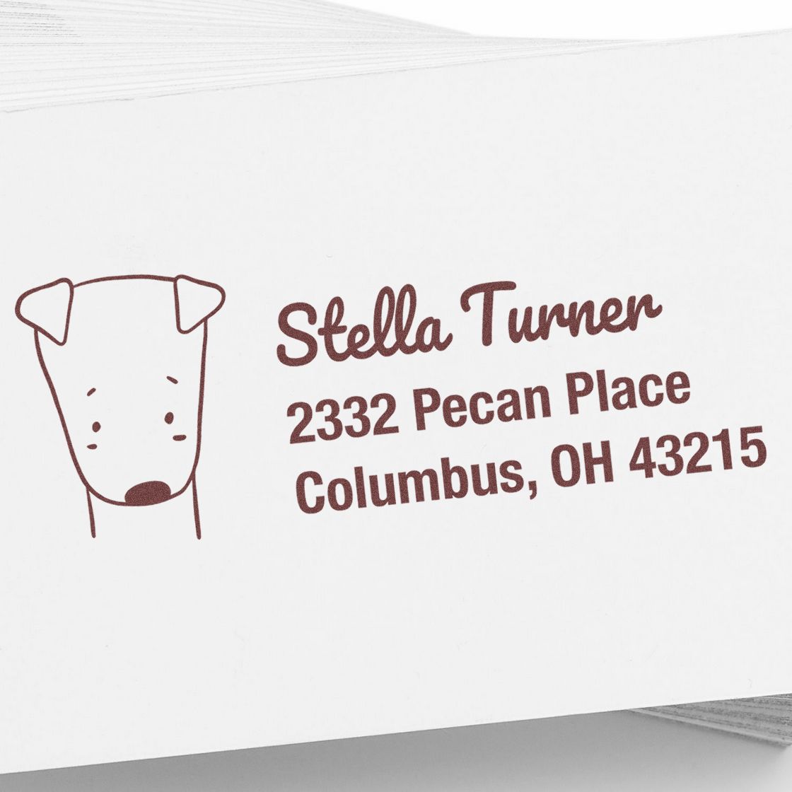 Custom rubber address stamp for Stella Turner, 2332 Pecan Place, Columbus, OH 43215, with dog icon.