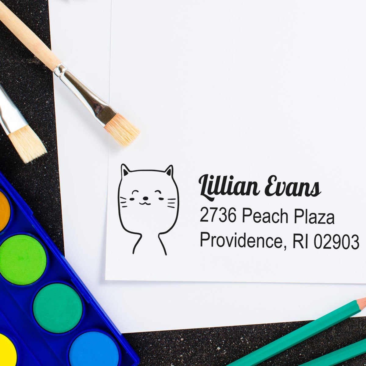 Custom cat return address rubber stamp on envelope with personalized name and address for mailing and crafting.