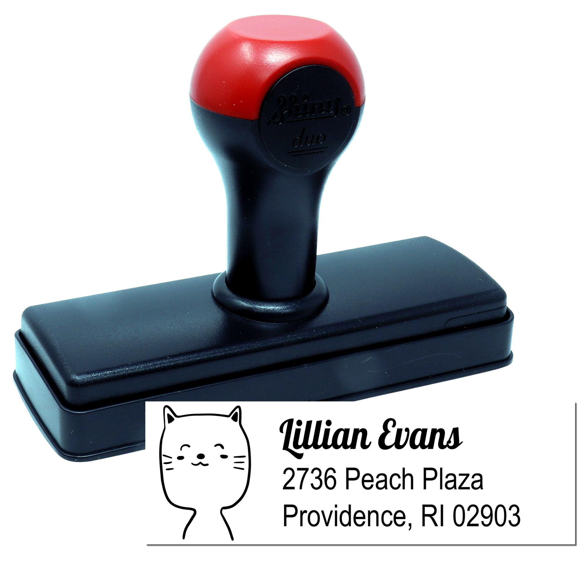 Custom self-inking rubber address stamp with cat logo and personalized Providence, RI return address imprint.