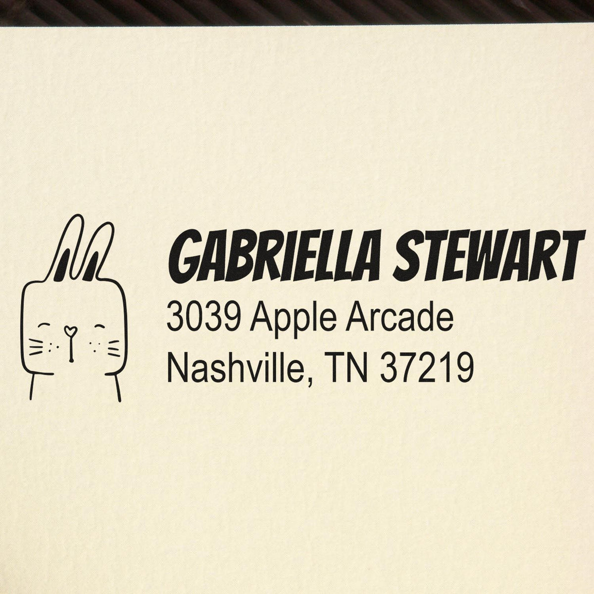 Custom address rubber stamp with bunny icon for Gabriella Stewart, Nashville, TN 37219