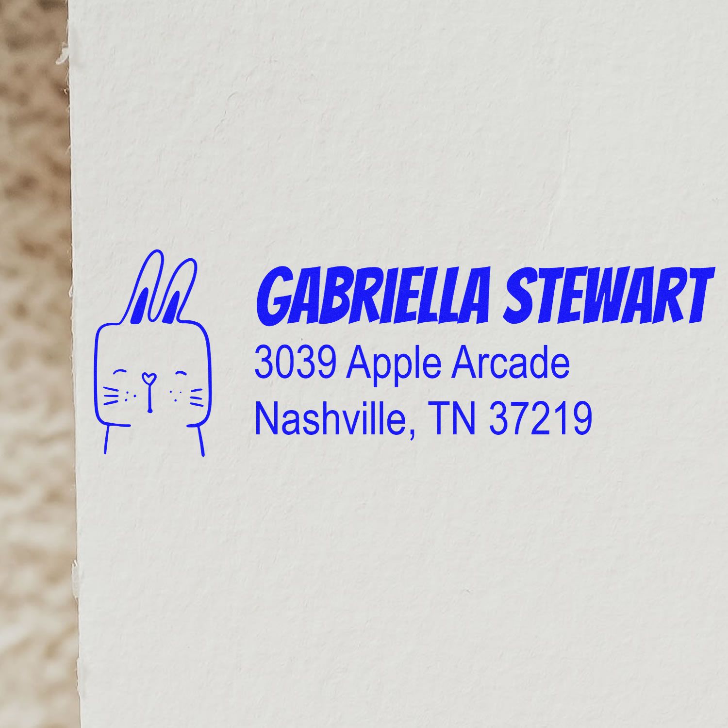 Custom return address rubber stamp for Gabriella Stewart, 3039 Apple Arcade, Nashville, TN 37219.