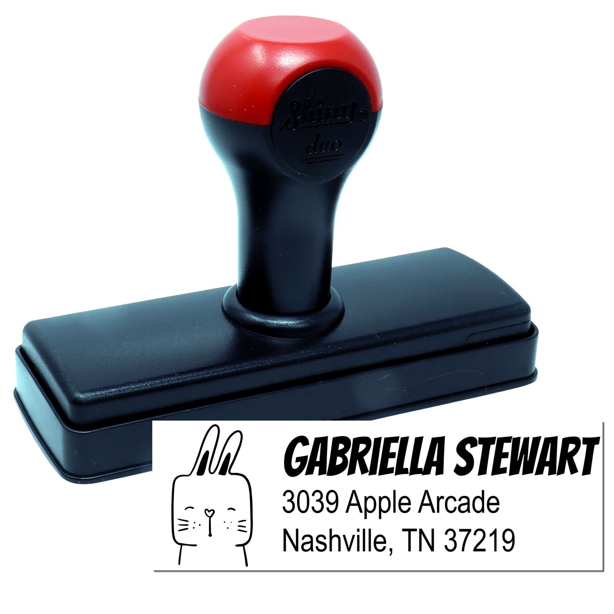 Custom self-inking rubber address stamp with Gabriella Stewart name and Nashville, TN return address