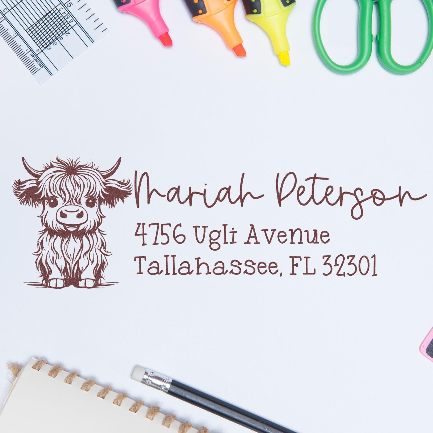 Custom cow address rubber stamp with name and Tallahassee, FL address for personalized business mailings and packaging.