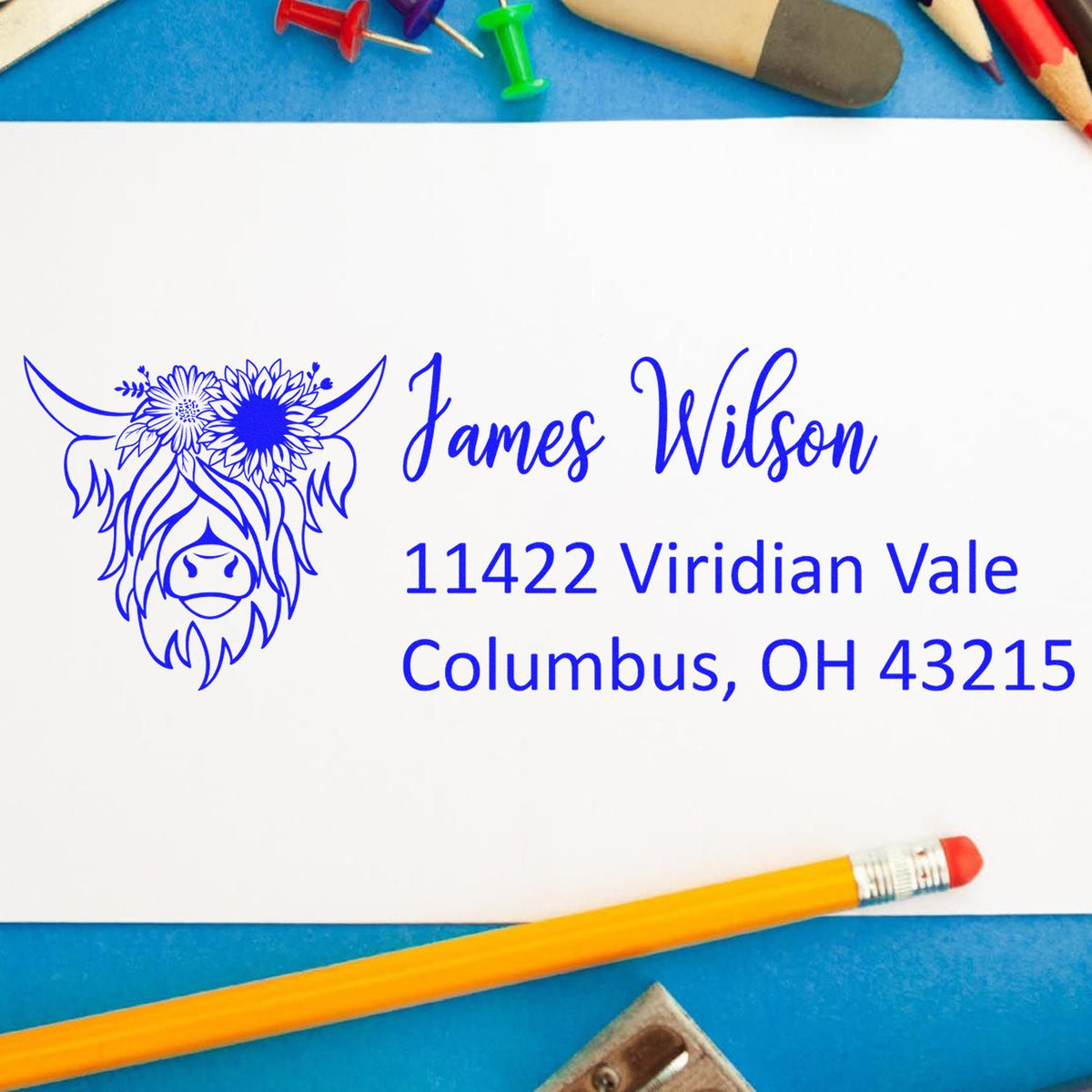 Personalized rubber address stamp with floral cow design, James Wilson name, and Columbus, OH 43215 mailing address.