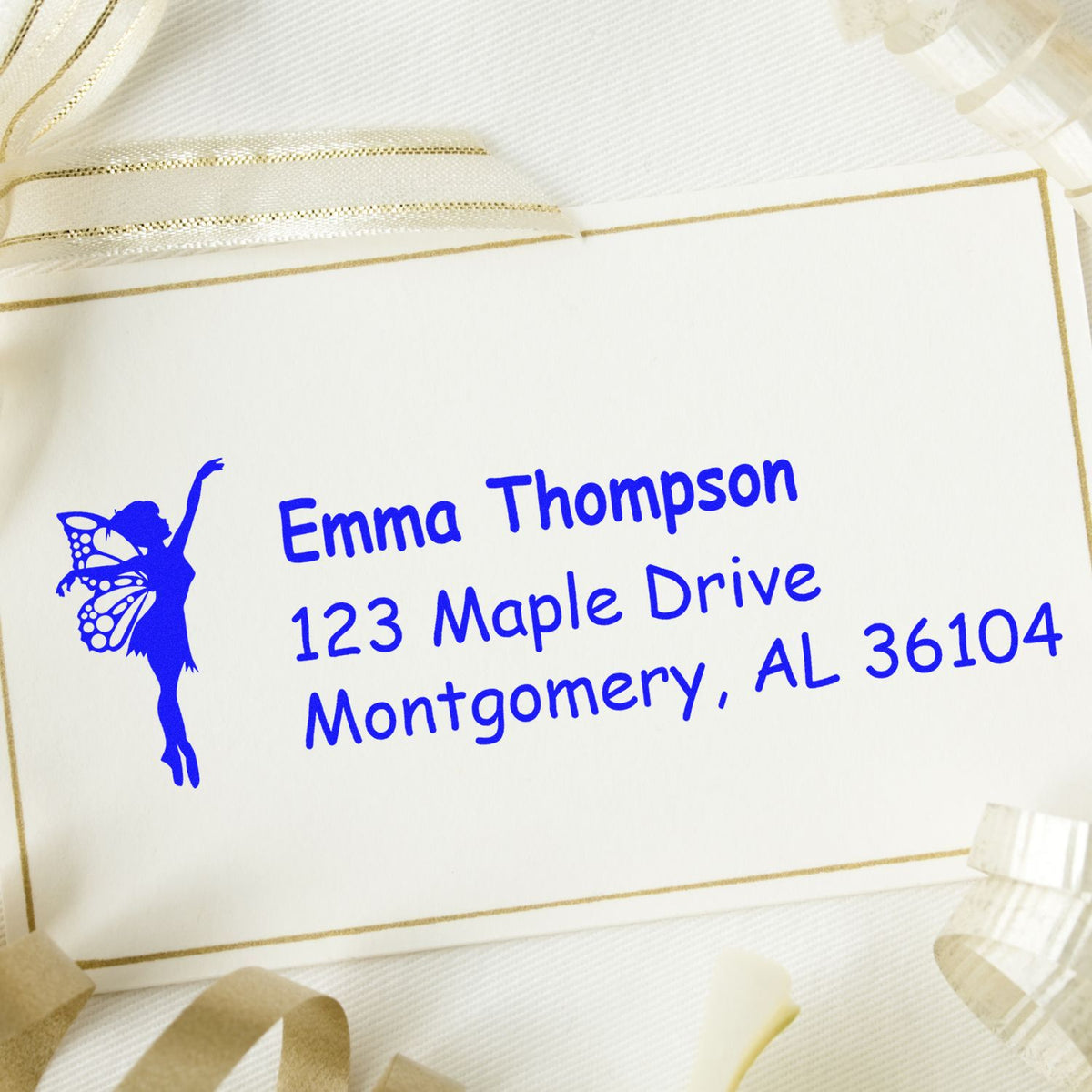 Custom return address rubber stamp with fairy silhouette, featuring Emma Thompson, 123 Maple Drive, Montgomery, AL 36104