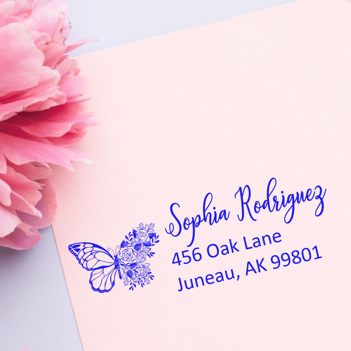 Personalized butterfly floral return address stamp for Sophia Rodriguez, 456 Oak Lane, Juneau, AK 99801