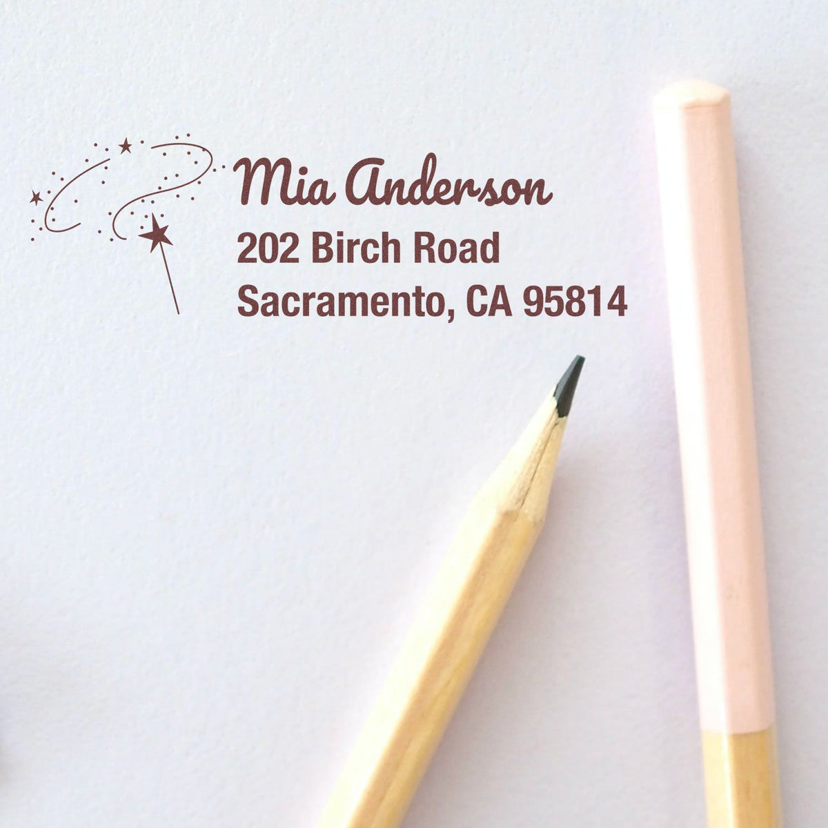 Personalized return address rubber stamp for Mia Anderson, 202 Birch Road, Sacramento, CA 95814, with pencil preview.