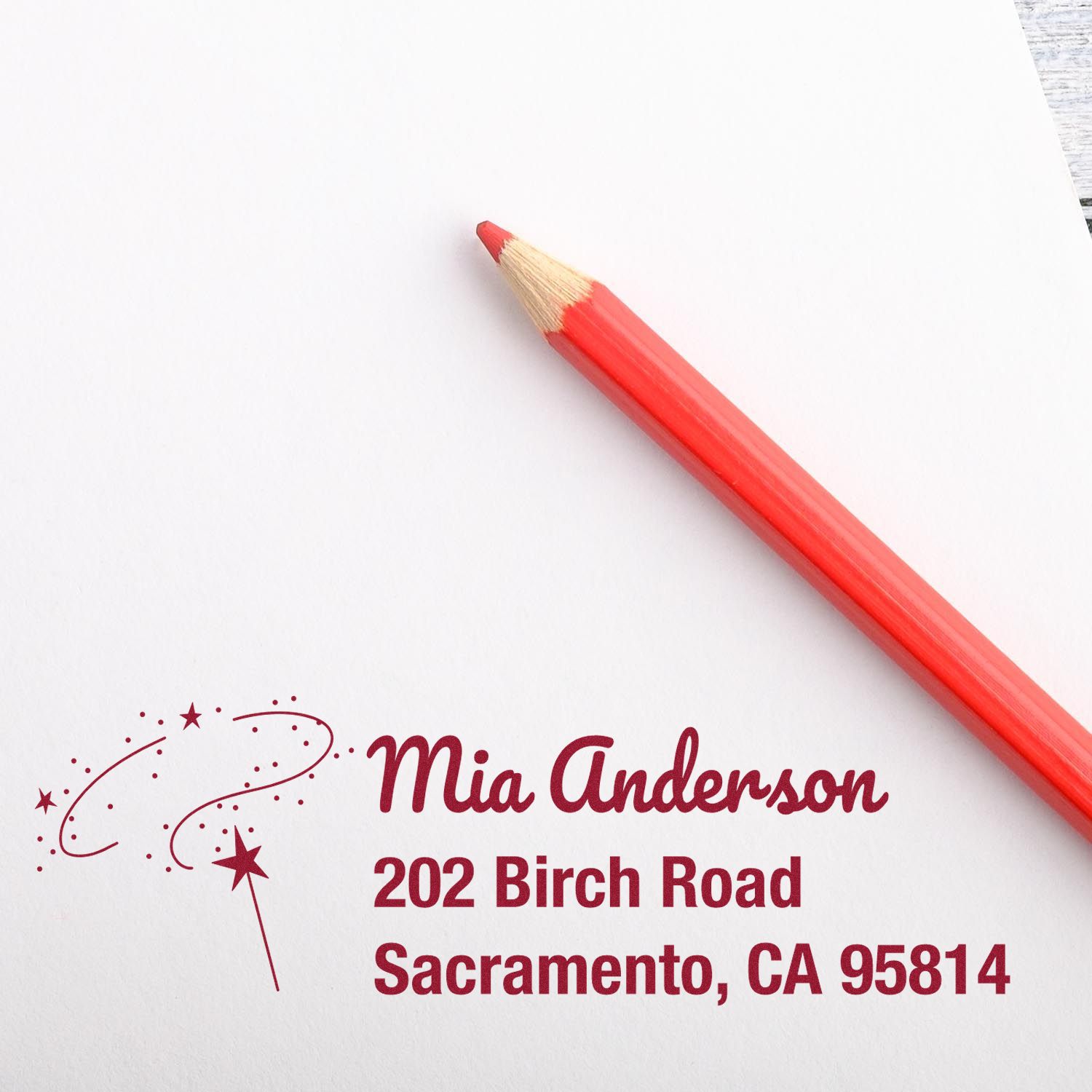 Custom return address rubber stamp with star wand design, showing Mia Anderson, 202 Birch Road, Sacramento, CA 95814.