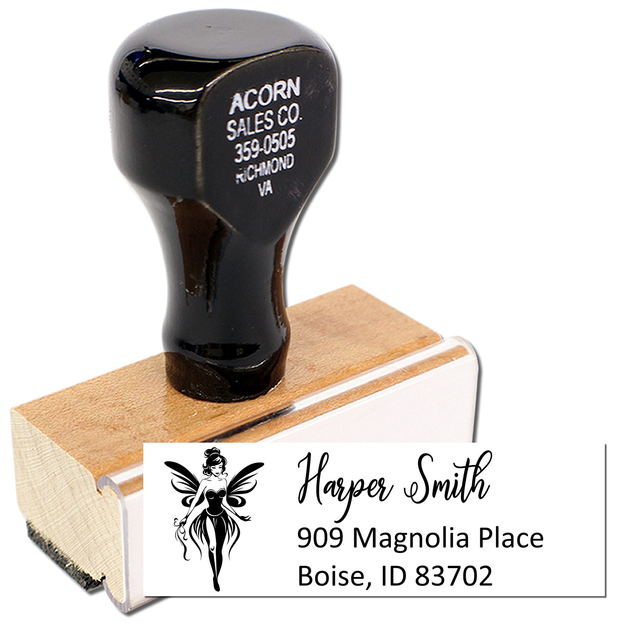 Custom rubber address stamp with fairy logo, Harper Smith name, and Boise, ID return address on a wooden stamp handle.