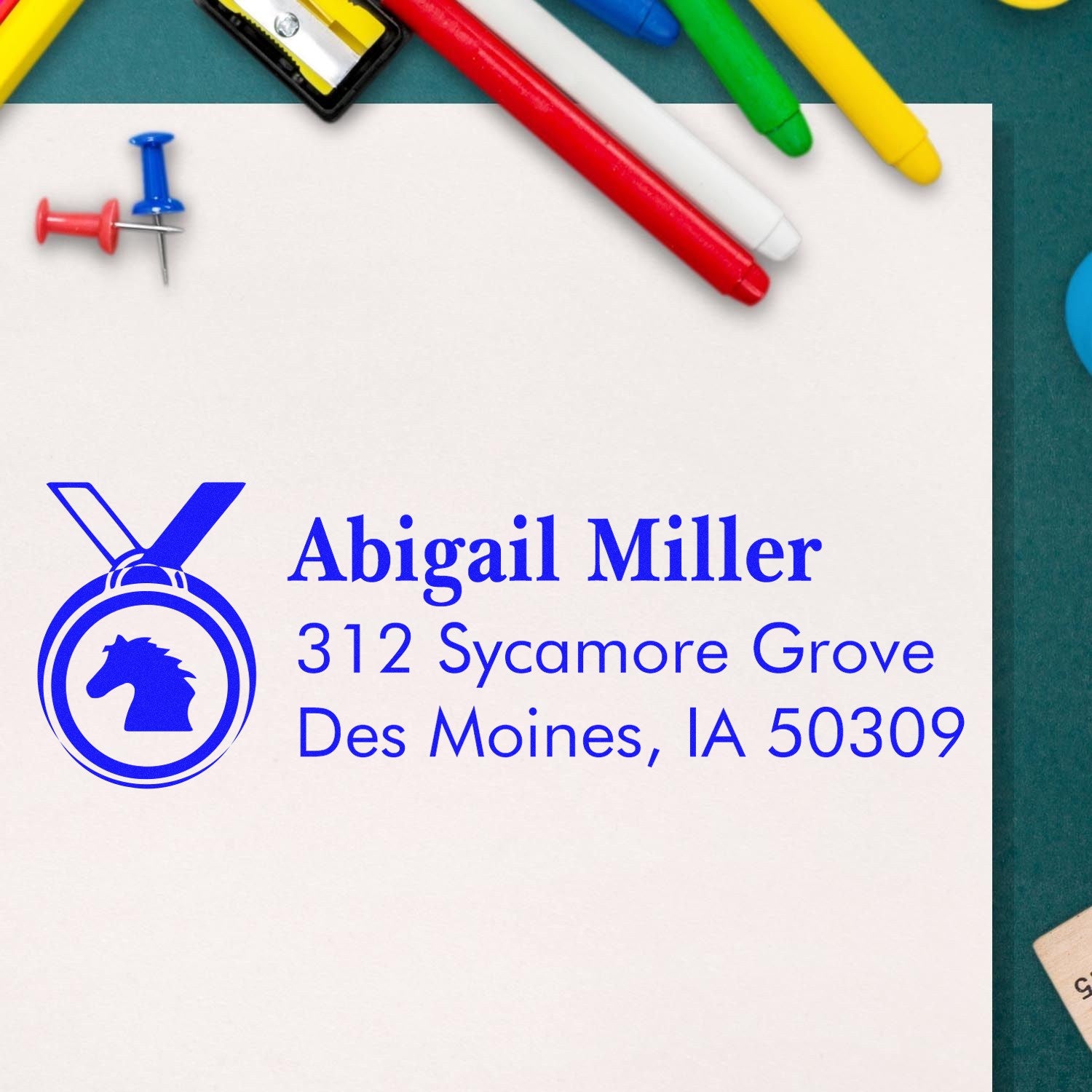 Custom personalized self-inking address rubber stamp with horse logo, Abigail Miller name and address for mail and office use.