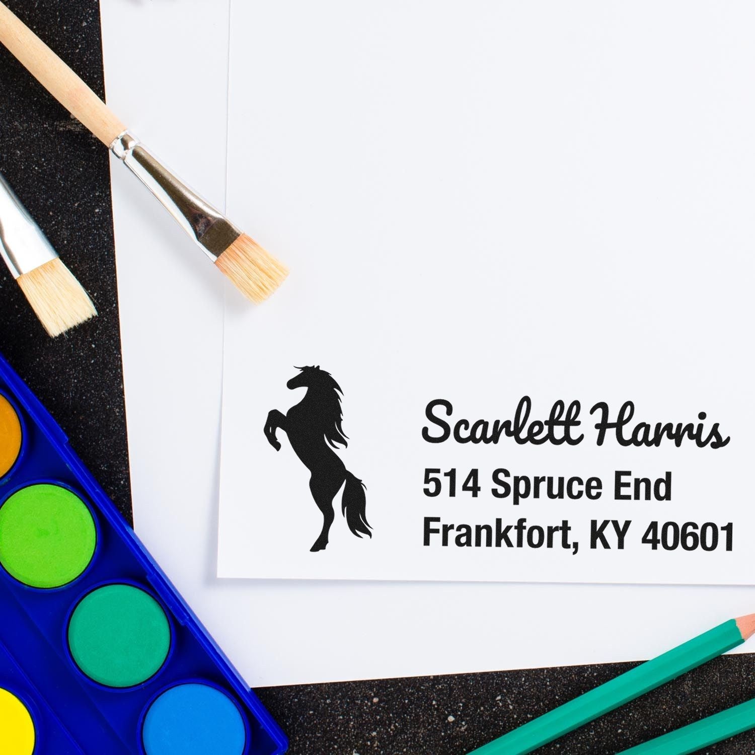 Custom rubber stamp with horse logo and return address, perfect for personalized stationery and envelopes.